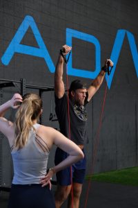 Trainer demonstrating exercise